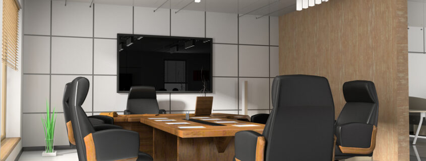 an empty conference room with black swivel chairs  