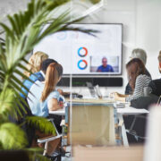 A group of people participating in a video conference call.
