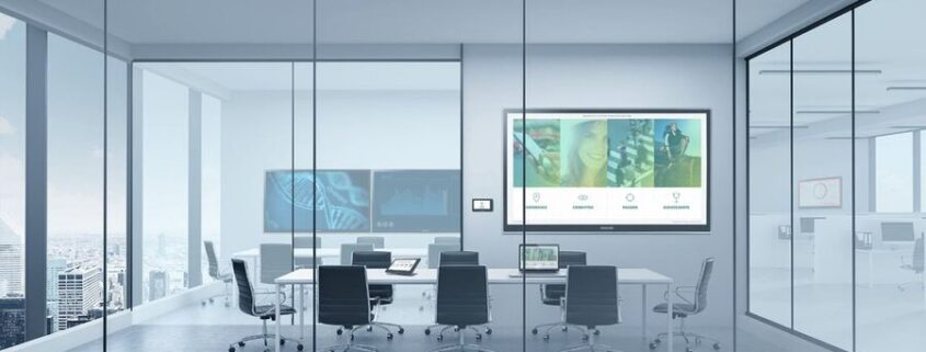 A comprehensive conference room featuring Crestron solutions seen through windows.