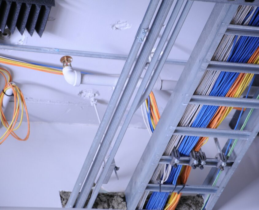 white wooden shelf with books