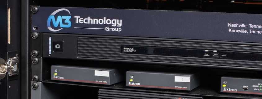 M3 Technology Group AV rack with Extron transmitters and Lenovo ThinkCentre in a Nashville rack room.