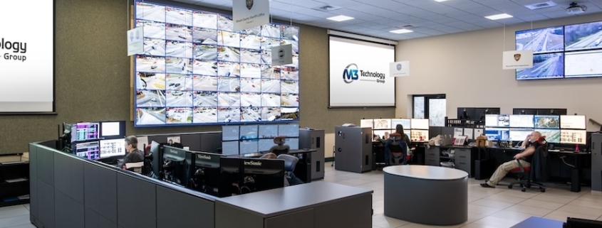 M3 Technology Group video wall showing a grid of traffic camera feeds in a 911 dispatch operations center.