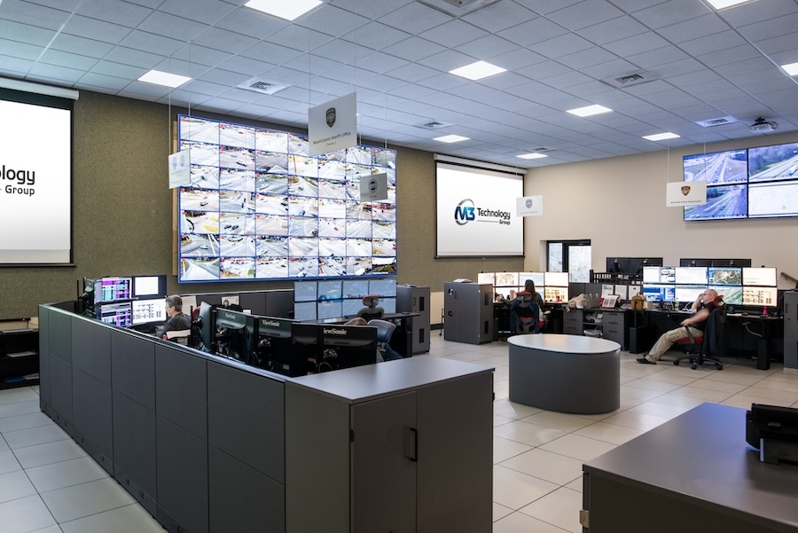 M3 Technology Group video wall showing a grid of traffic camera feeds in a 911 dispatch operations center.